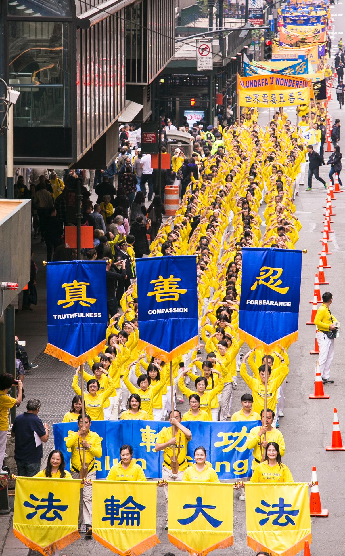 Around 10,000 Falun Gong practitioners march in the World Falun Dafa parade in New York on May 13, 2016. (Samira Bouaou/Epoch Times)