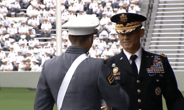 Lt. Gen. Robert Caslen Jr., superintendent of the U.S. Military Academy (R) gives diploma to cadet at commencement ceremonies at West Point on May 21, 2016. (Courtesy West Point)