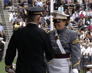 Lt. Gen. Robert Caslen Jr., superintendent of the U.S. Military Academy (L) gives diploma to cadet at commencement ceremonies at West Point on May 21, 2016. (Courtesy West Point)