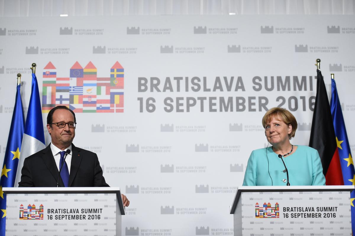 French President Francois Hollande (L) and German Chancellor Angela Merkel deliver a joint statement after the European Union Summit of 27 Heads of State or Government in Bratislava, Slovakia, on Sept. 16, 2016. (Stephane de Sakutin/AFP/Getty Images)