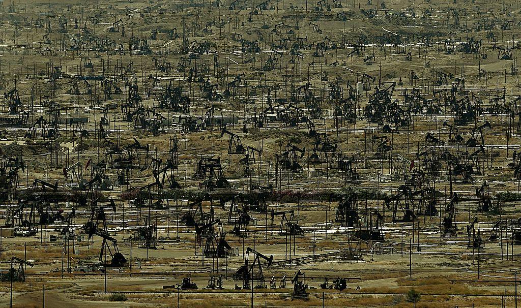 An oil field with a large number of pumping jacks operating in the Central Valley of California on June 24, 2015. (Mark Ralston/AFP/Getty Images)