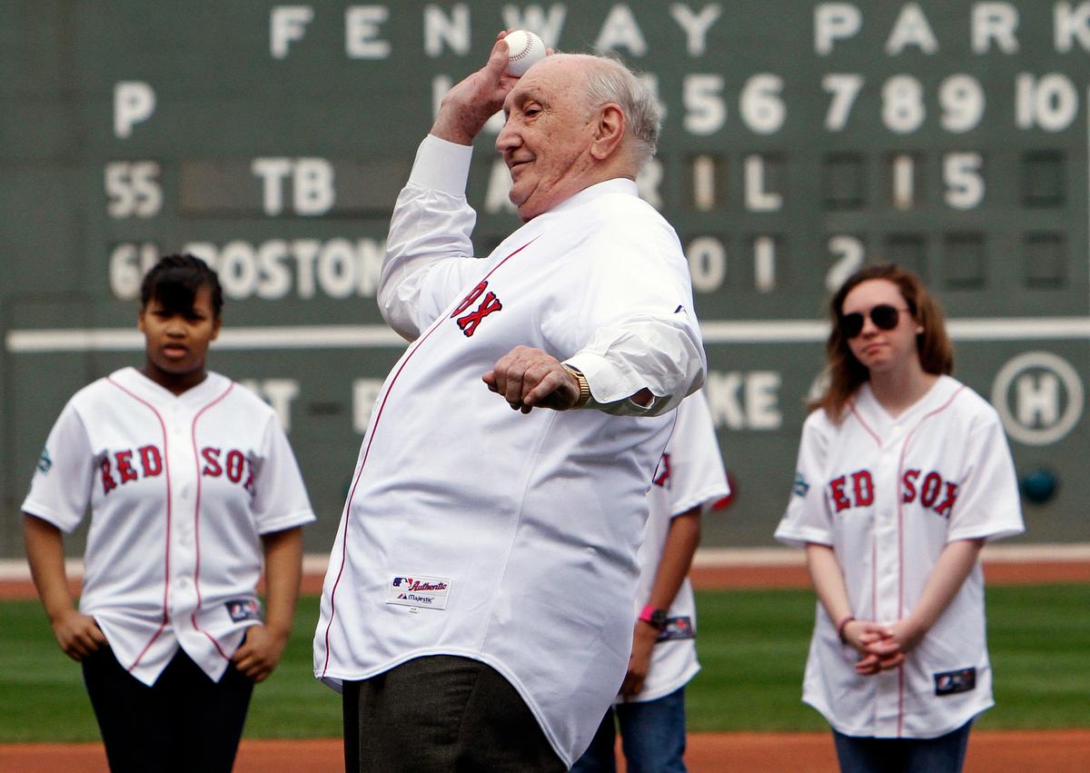 Former baseball player Ralph Branca throws out the first pitch before a baseball game between the Boston Red Sox and the Tampa Bay Rays in Boston on April 15, 2012. (AP Photo/Michael Dwyer, File)