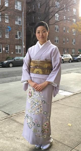 Japanese tea master Satoko Souheki Mori, wears a kimono painted by Toshiharu Hisatsune in front of the Kosaka restaurant in New York on Nov. 13, 2016. (Satoko Souheki Mori)