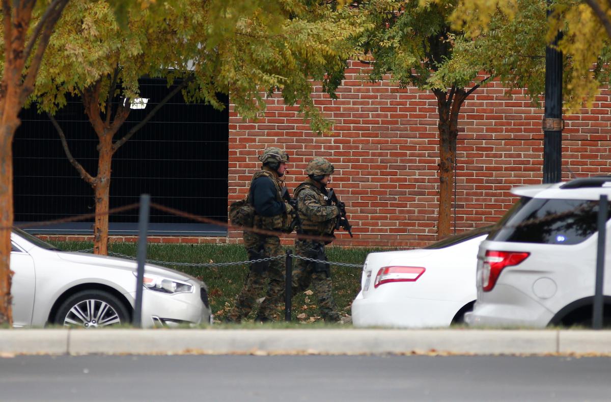 Law enforcement patrols outside of a parking garage after an attack on the campus of Ohio State University in Columbus, OH., on Nov. 28, 2016. (AP Photo/Jay LaPrete)
