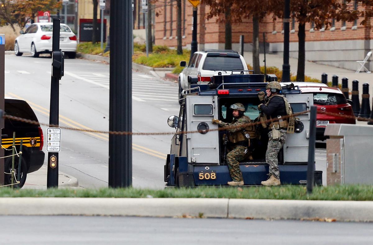 Members of the Columbus SWAT team work the scene around a parking garage after reports of a shooting on the campus of Ohio State University in Columbus, Ohio on Nov. 28, 2016. (AP Photo/Jay LaPrete)