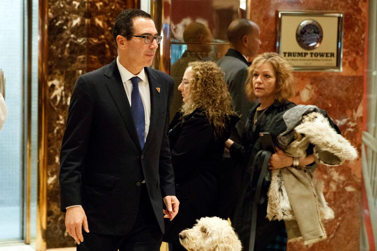 Steven Mnuchin, national finance chairman of President-elect Donald Trump's campaign, walks to lunch at Trump Tower in New York on Nov. 29, 2016. (AP Photo/Evan Vucci)