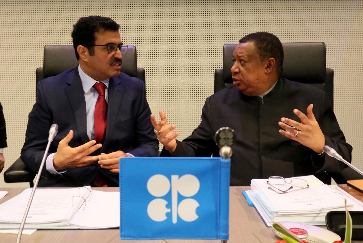 Mohammed Bin Saleh Al-Sada, Minister of Energy and Industry of Qatar and President of the OPEC Conference talks with Mohammad Sanusi Barkindo (L-R) OPEC Secretary General of Nigeria prior to the start of a meeting of the Organization of the Petroleum Exporting Countries, OPEC, at their headquarters in Vienna, Austria, on Nov. 30, 2016. (AP Photo/Ronald Zak)