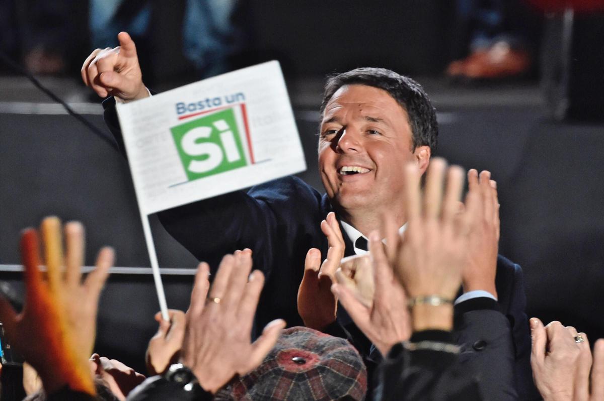 Italian Premier Matteo Renzi addresses a rally on the upcoming Italian constitutional referendum in Florence, Italy, on Dec. 2, 2016. (Maurizio Degl'Innocenti/ANSA via AP)