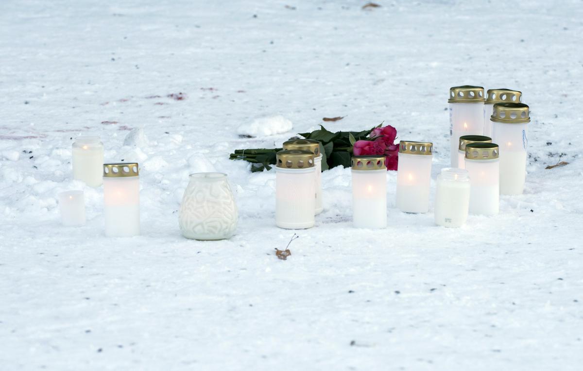 Candles in front of the restaurant Vuoksenvahti where three women were killed in a shooting incident, in Imatra, Finland, on Dec. 4, 2016. (Hannu Rissanen/Lehtikuva via AP)