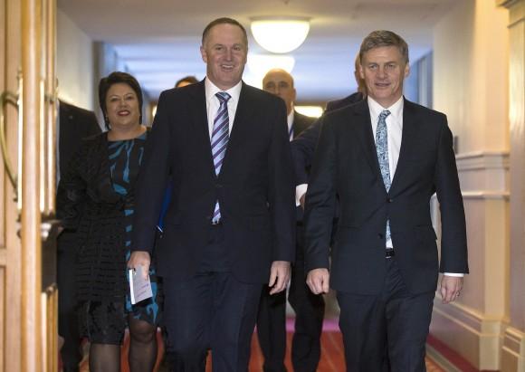 Finance Minister Bill English, right, walks with New Zealand Prime Minister John Key to the House to deliver his Budget 2016 speech, in Wellington, New Zealand, on May 26, 2016. (Mark Mitchell/New Zealand Herald via AP)