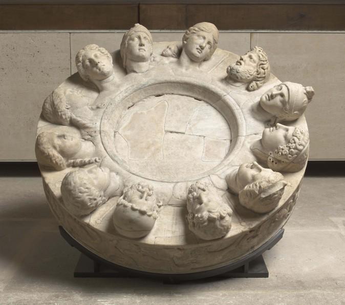 Altar with zodiac frieze and heads of the 12 gods, circa 117–138 CE, Gabii, Latium. Marble, 33 inches in diameter by 10 inches deep. Musée du Louvre, Paris. (RMN-Grand Palais /Hervé Lewandowski/Art Resource, NY)