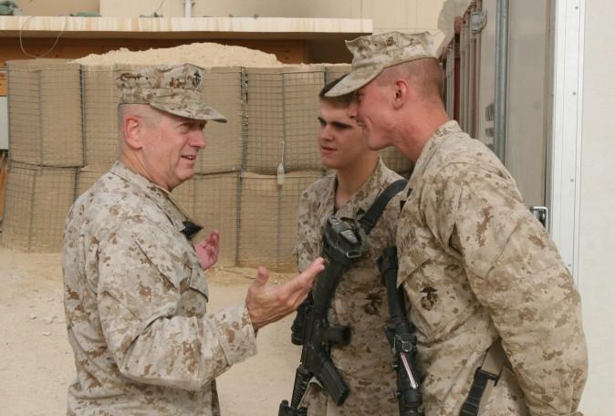 Marine Lt. Gen. James Mattis greets two corporals after arriving at the combat operations point military housing complex in Baghdadi, Iraq, in 2007. (Lance Cpl. Brian L. Lewis, USMC)