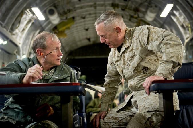 U.S. Army Gen. Martin Dempsey (L), chairman of the Joint Chiefs of Staff, and U.S. Marine Corps Gen. James Mattis, commander of U.S. Central Command, on board a C-17 while flying to Baghdad on Dec. 15, 2011. (DOD)