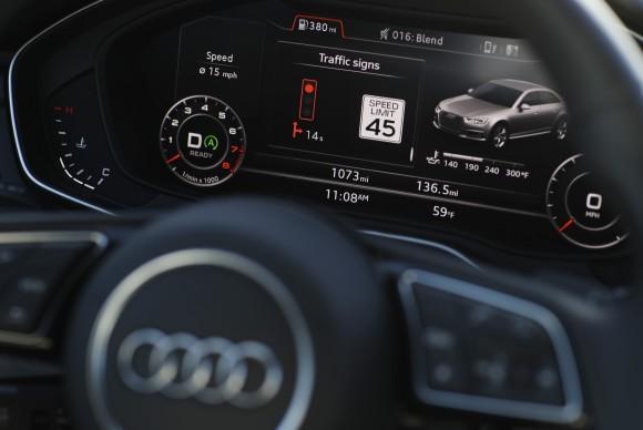 The dashboard of an Audi A4 is seen during a demonstration of Audi's vehicle-to-infrastructure technology in Las Vegas, on Dec. 6, 2016. (AP Photo/John Locher)
