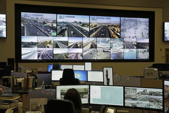 Screens show the feeds from traffic cameras at the Regional Transportation Commission of Southern Nevada's FAST traffic management center, on Dec. 6, 2016. (AP Photo/John Locher)