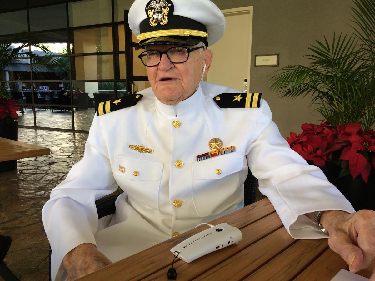 Jim Downing, 103, poses in a Navy uniform in Honolulu, on Dec. 5, 2016.(AP Photo/Audrey McAvoy)