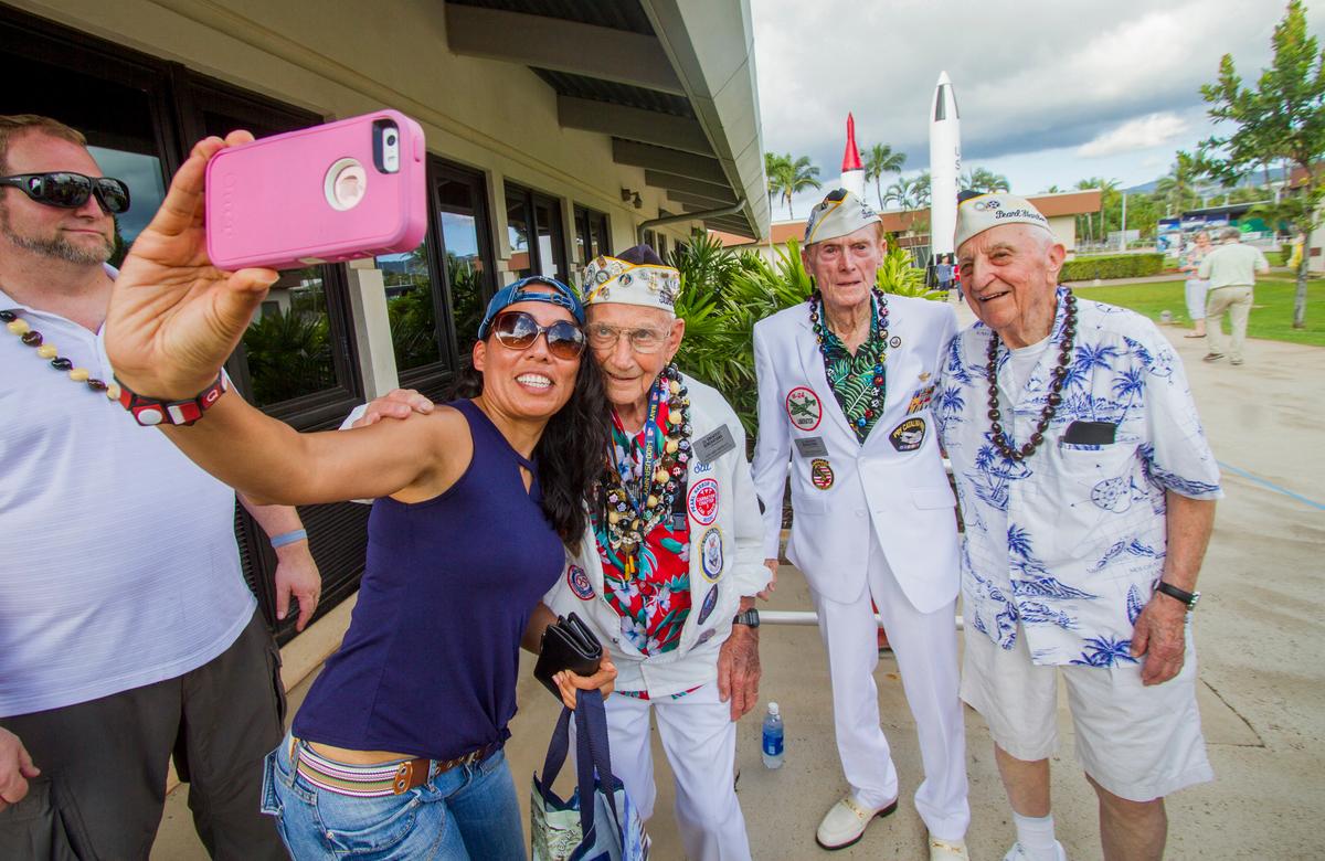 About 30 Pearl Harbor Survivors with the "Greatest Generation" vets meet and greet with visitors at the Pearl Harbor Visitor Center in Honolulu on Dec. 5, 2016. (Dennis Oda/The Star-Advertiser via AP)