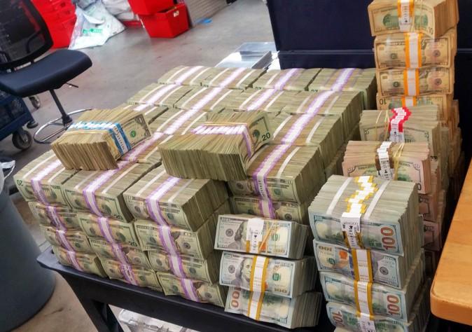 U.S. Border Patrol confiscated more than $3 million in cash that two men were trying to smuggle into Mexico from California in August 2016. (U.S. Border Patrol via AP)