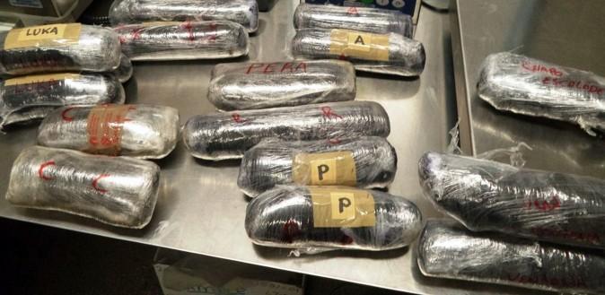 U.S. Customs and Border Protection shows 16 packages of methamphetamine and heroin found in a car being driven by two Mexican nationals at the U.S.-Mexico border port of entry in Nogales, Ariz., on June 10, 2015. (U.S. Customs and Border Protection via AP)