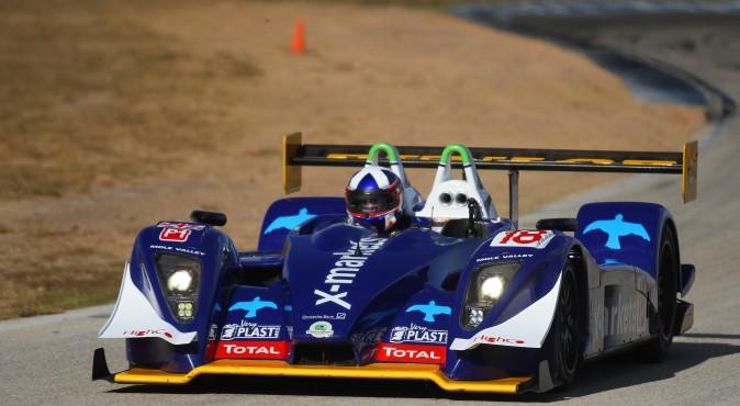 David Porter and Richard Bradley's #18 Pescarolo-Judd completed 80 laps in the 12 hours, making it the overall winner. (Chris Jasurek/Epoch Times)