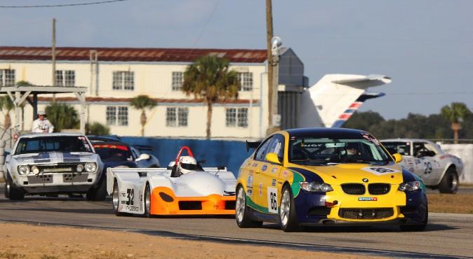 Group E action: The #86 08 BMW M3/GT4 of Jeremy Cooke and Mike Dowd leads Miguel Vidal's #32 1996 Toyota WSR, the two 1967 Camaros of Grahame and Oliver Bryant, and Ben and Chris Beighton and Alec Hammond, Kathy Blaha's #14 1974 Porsche 911 RSR, Chris Beighton and Alec Hammond 1966 Ford Mustang 2+2. (Chris Jasurek/Epoch Times)