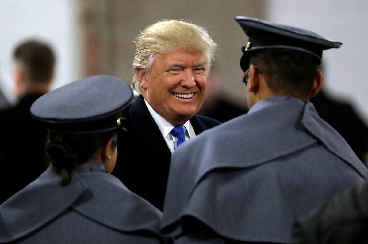 President-elect Donald Trump, center, greets Army Cadets before the Army-Navy NCAA college football game in Baltimore on Dec. 10, 2016. (AP Photo/Patrick Semansky)