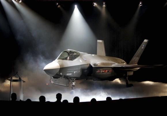 The Lockheed Martin F-35 Joint Strike Fighter is shown after it was unveiled in a ceremony in Fort Worth, Texas in this July 7, 2006, file photo. Shares of Lockheed Martin fell Monday, Dec. 12, 2016, as President-elect Donald Trump tweeted that making F-35 fighter planes is too costly and that he will cut "billions" in costs for military purchases. (AP Photo/LM Otero, File)