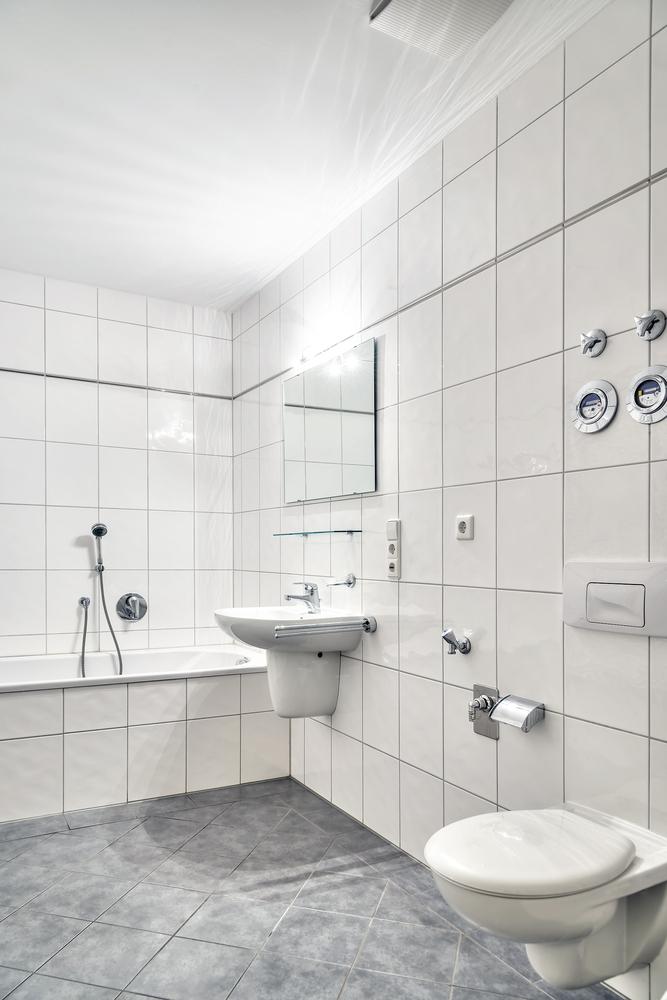 Bathroom fixtures are elevated off the floor to keep the space open and flowing. (Wolgang Zwanzger/Shutterstock)