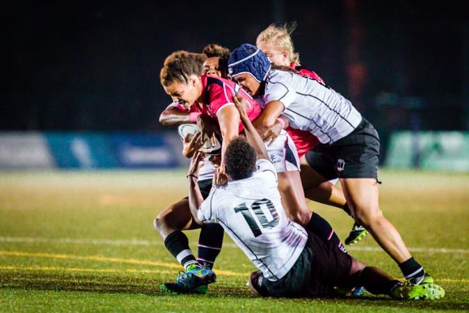 Hong Kong's Natasha Olson-Thorne battles towards the Fiji line in their World Cup qualifier match at King's Park on Friday Dec 9, 2016. (Dan Marchant)