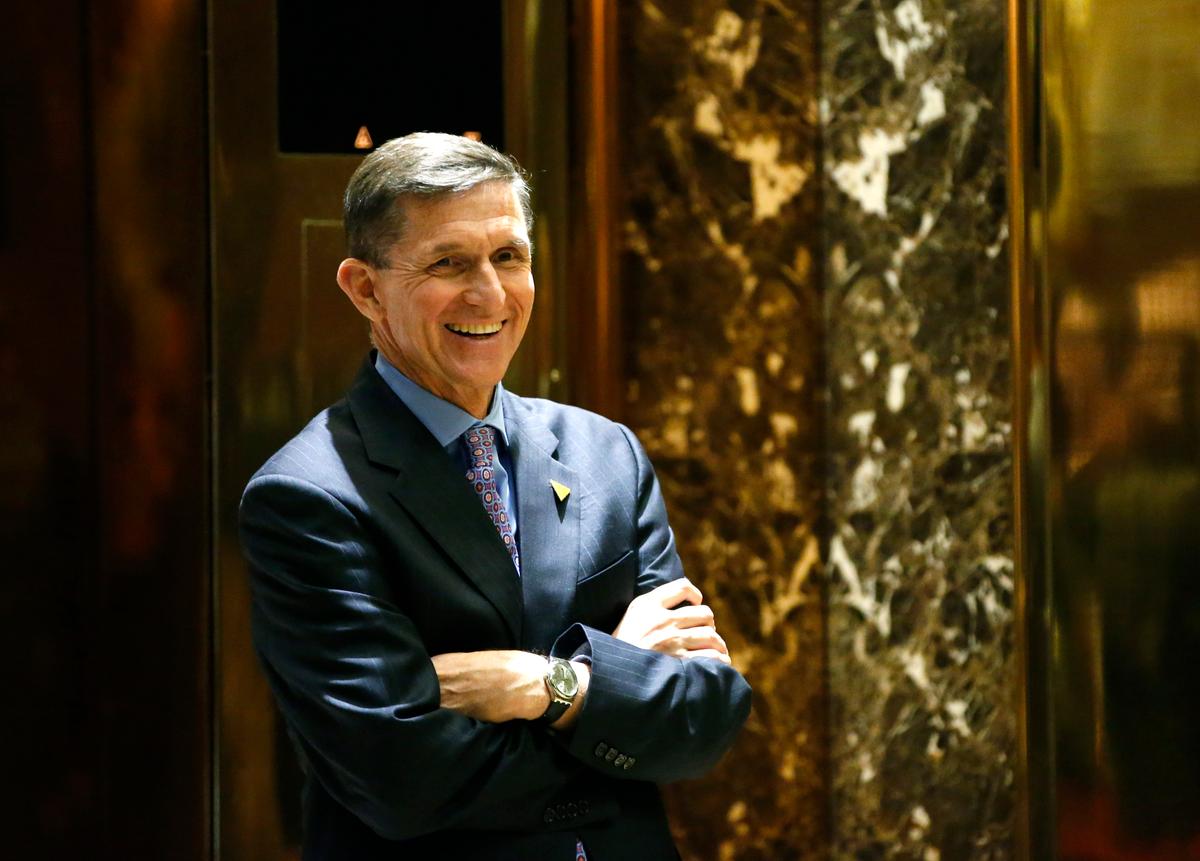 President-elect Donald J. Trump's choice for National Security Advisor, Michael T. Flynn, waits for an elevator at Trump Tower, on Dec. 12, 2016. (AP Photo/Kathy Willens)