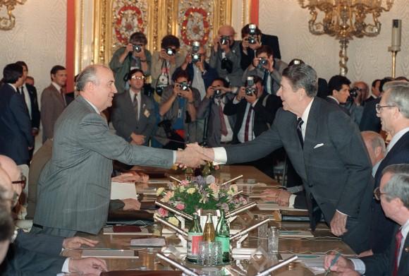 US President Ronald Reagan (R) shaking hands with Soviet leader Mikhail Gorbachev at St. Catherine's Hall, Kremlin Place prior to their last summit meeting on June 1, 1988. (MIKE SARGENT/AFP/Getty Images)