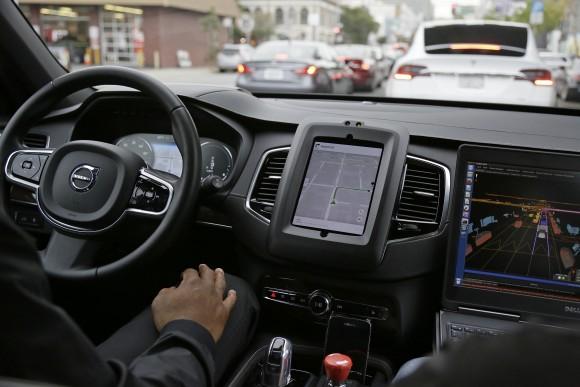 An Uber driverless car waits in traffic during a test drive in San Francisco, Dec. 13, 2016 (AP Photo/Eric Risberg)