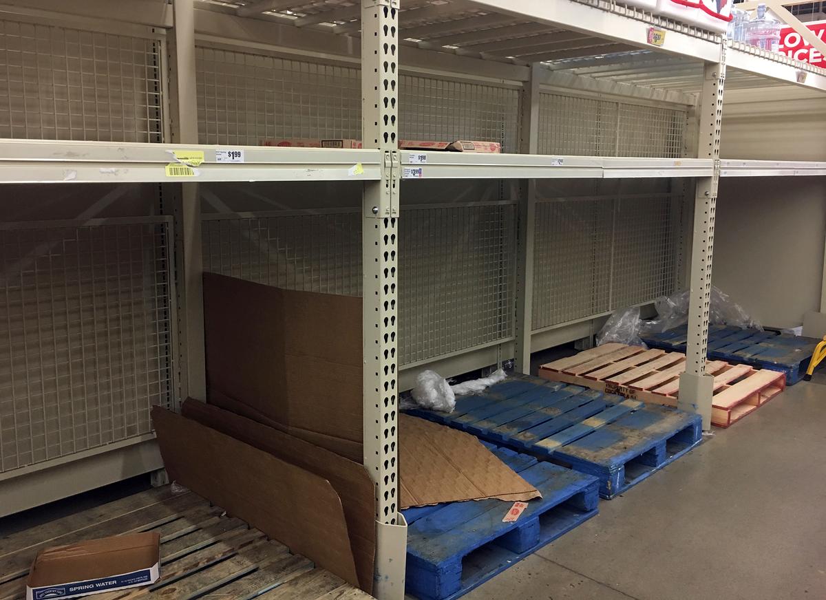 Empty shelves are left after residents rushed to H-E-B to buy water after a recent back-flow incident in the industrial district according to a city news release, in Corpus Christi, TX., on Dec. 15, 2016. (Gabe Hernandez/Corpus Christi Caller-Times via AP)