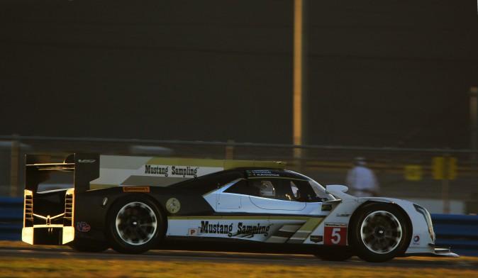 The #5 Action Express Cadillac DPi V.R. gets in a few final laps as the sun sets Tuesday, Dec. 13. (Chris Jasurek/Epoch Times)