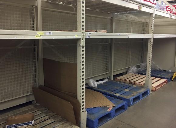 Empty shelves are left after residents rushed to H-E-B to buy water after a recent back-flow incident in the industrial district according to a city news release, in Corpus Christi, Texas, on Dec. 15, 2016. (Gabe Hernandez/Corpus Christi Caller-Times via AP)