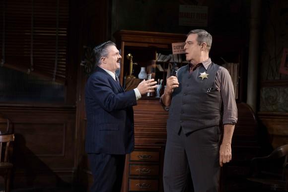 (L–R) Newspaperman Walter Burns (Nathan Lane) realizes that Sheriff Hartman (John Goodman) framed a man, who was then convicted of killing a police officer, just so Hartman could be reelected. (Julieta Cervantes)