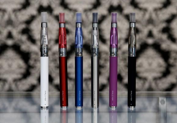 In this file photo, E-cigarettes appear on display at Vape store in Chicago. (AP Photo/Nam Y. Huh)