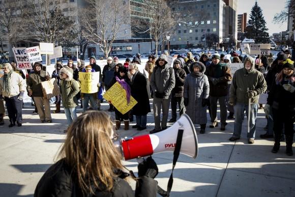 Protestors rally at the Michigan State Capitol before the state electoral college met to cast their votes in Lansing, Mich., United States on Dec. 19, 2016. The electoral college met in the afternoon and voted unanimously for Trump. Electors from all 50 states cast votes today in their respective state capitols. (Sarah Rice/Getty Images)