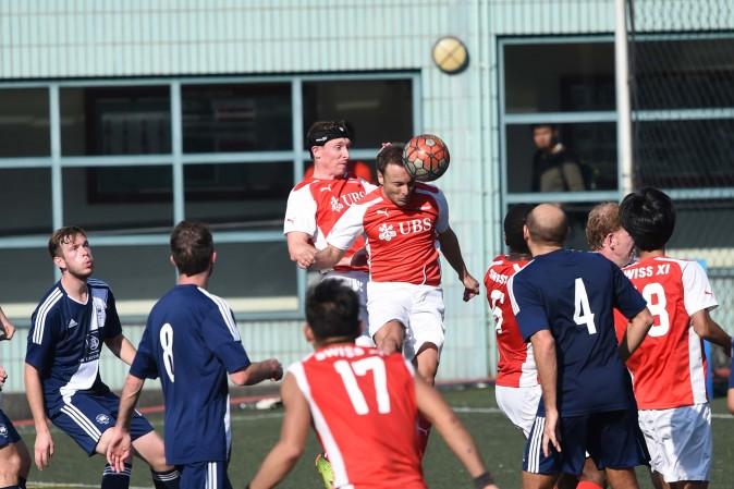 Good header: Swiss XI score during their 3-2 defeat by Club Wanderers in Division 1 of the Yau Yee League on Sunday Dec 18, 2016. (Bill Cox/Epoch Times)