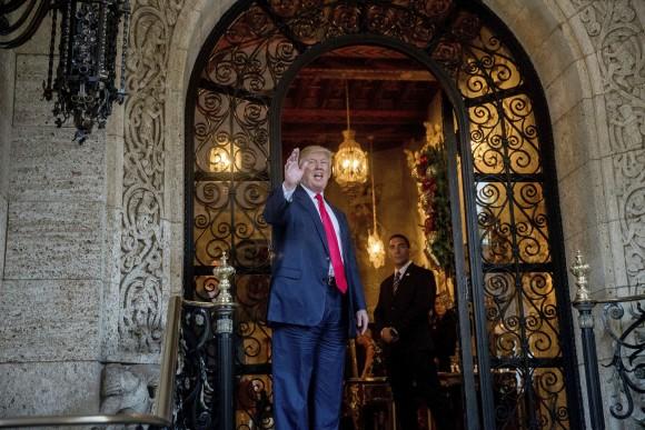 President-elect Donald Trump waves to members of the media after a meeting with admirals and generals from the Pentagon at Mar-a-Lago, in Palm Beach, Fla., on Dec. 21, 2016. (AP Photo/Andrew Harnik)