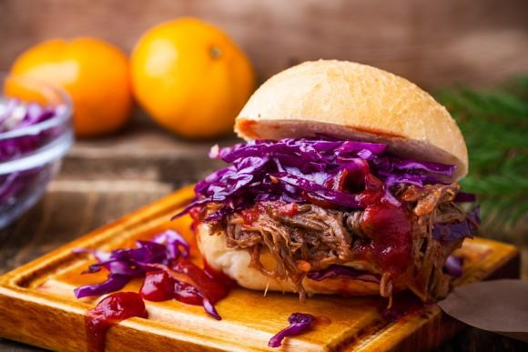 Homemade bbq beef burger with crunchy red cabbage slaw (istetiana/shutterstock)