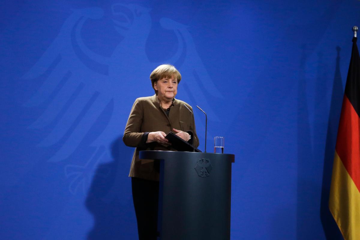German Chancellor Angela Merkel briefs the media during a statement at the chancellery in Berlin, on Dec. 23, 2016. (AP Photo/Markus Schreiber)