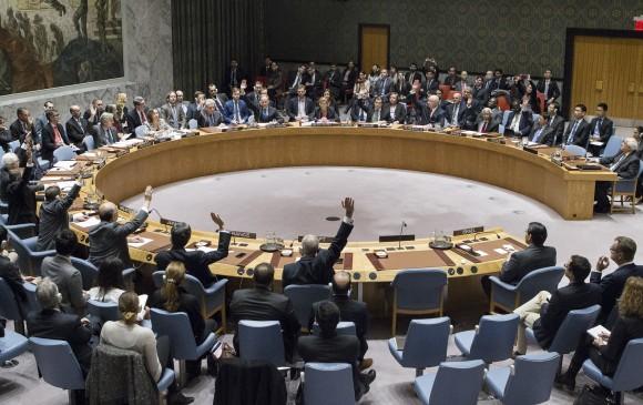 In this photo provided by the United Nations (UN), members of the UN Security council vote at the UN headquarters on Dec. 23, 2016, in favor of condemning Israel for its practice of establishing settlements in the West Bank and east Jerusalem. In a striking rupture with past practice, the U.S. allowed the vote, not exercising its veto. (Manuel Elias/The United Nations via AP)