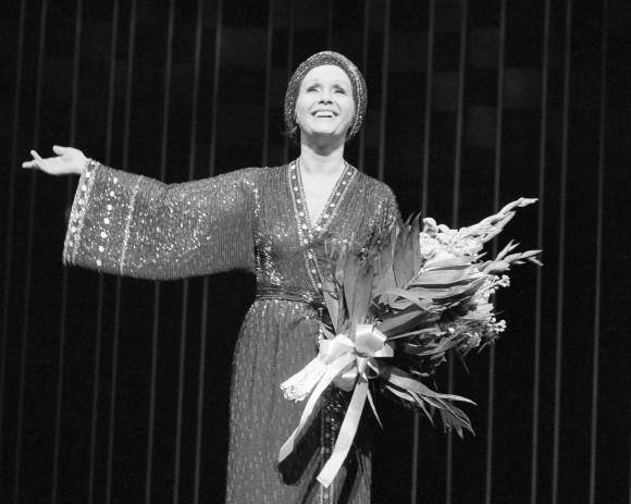 In this file photo, actress Debbie Reynolds returns for a curtain call after a performance of "Woman of the Year" at New York's palace theatre. (AP Photo/Kaye)