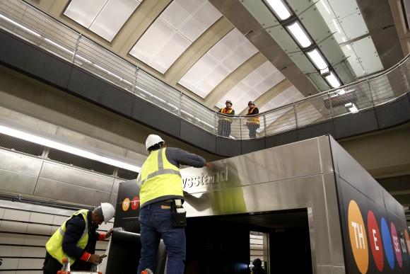 Workers put the finishing touches on the new 86th Street subway station on the new Second Avenue line in New York on Dec. 22, 2016. (AP Photo/Seth Wenig)