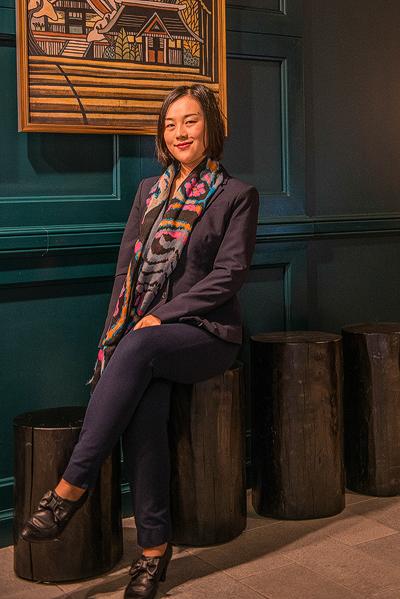 As a young professional working as an accountant for a high-end boutique hotel chain, Gu is on top of her world with a new life in the United States and awaiting a reunion with her parents. (Cat Rooney/Epoch Times)