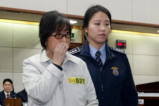 Choi Soon-sil, left, the jailed confidante of impeached South Korean President Park Geun-hye, appears for her trial at the Seoul Central District Court in Seoul, Thursday, on 5, 2017. (Chung Sung-Jun/Pool Photo via AP)