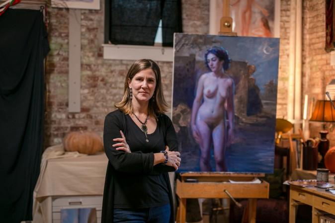 Artist Patricia Watwood with her painting in progress (working title: "Susanna and The Elders") in her home studio in Brooklyn, New York, on Dec. 14, 2016. (Benjamin Chasteen/Epoch Times)
