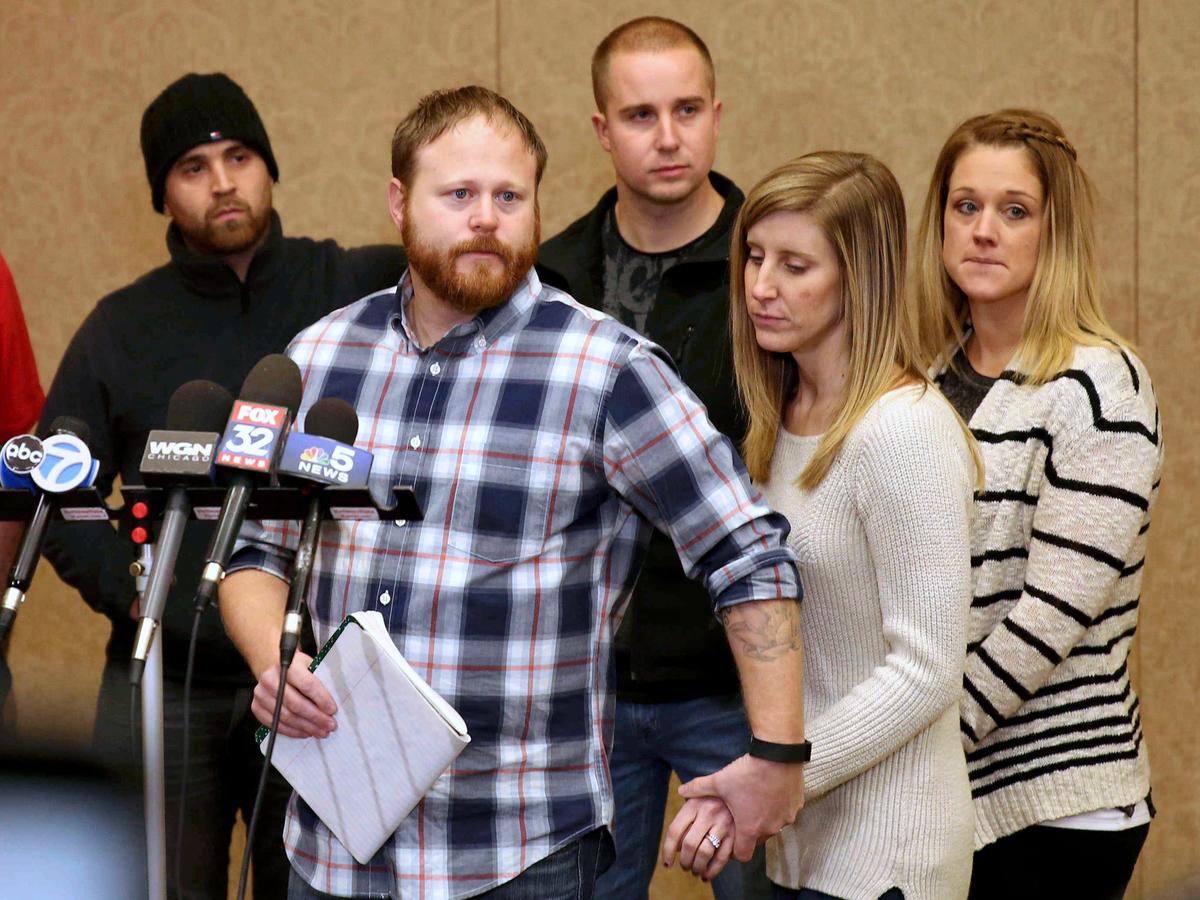 Family spokesman David Boyd and others hold a news conference on Jan. 5, 2017. (Patrick Kunzer/Daily Herald via AP)