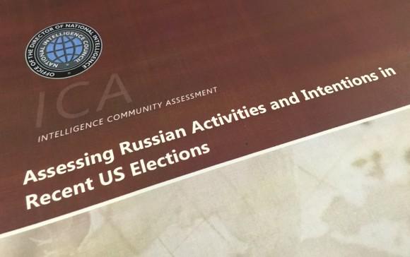 A part of the declassified version Intelligence Community Assessment on Russia's efforts to interfere with the U.S. political process in Washington on Jan. 6, 2017. (AP Photo/Jon Elswick)